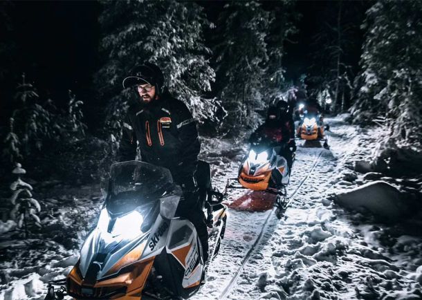The land of Northern lights, snowmobiling